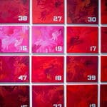 A grid of 20 square panels in various shades of red and pink, featuring abstract depictions of birds and numbers in white, arranged in four rows and five columns.