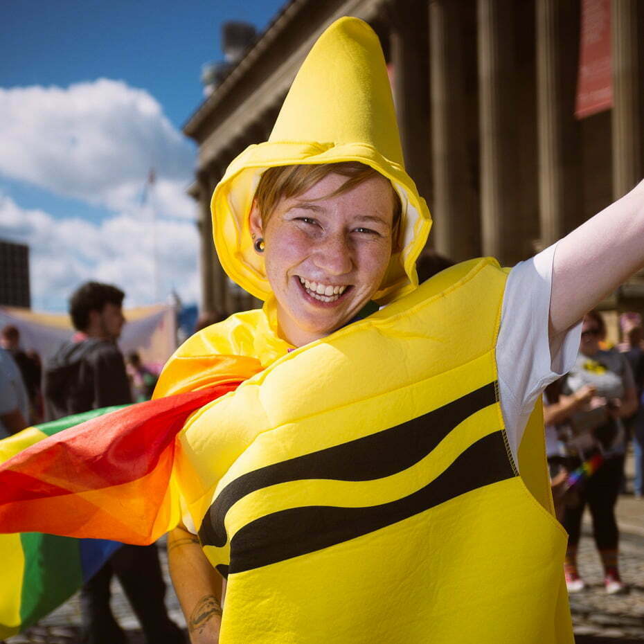 Appearing as Super Crayon at Liverpool Pride march. Michaela said creativity is her power. It's the key to imagination. Her girlfriend followed behind making sure her flag was always flying. Liverpool, UK, on 3rd August, 2013.