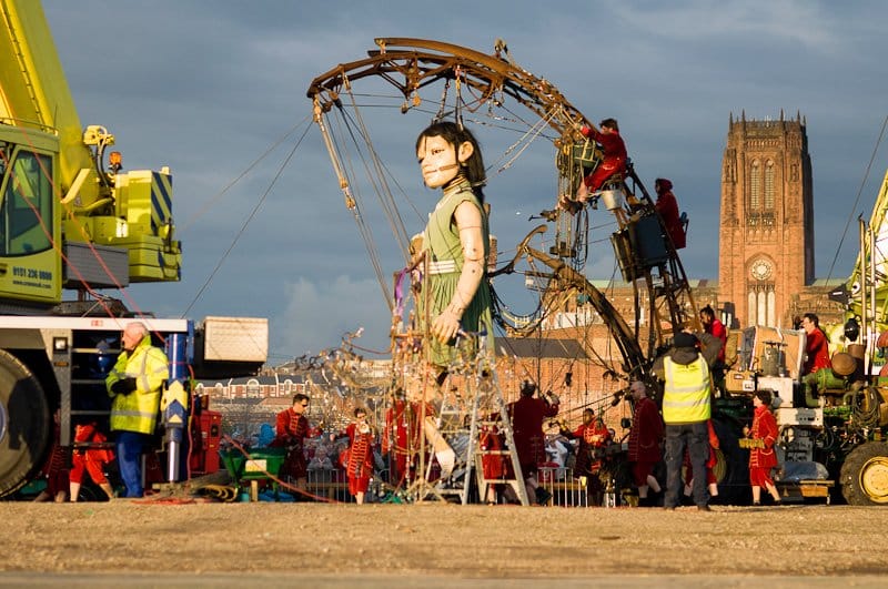 Giants roam the streets of Liverpool.