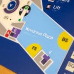 Close up of text on a display with braille underneath